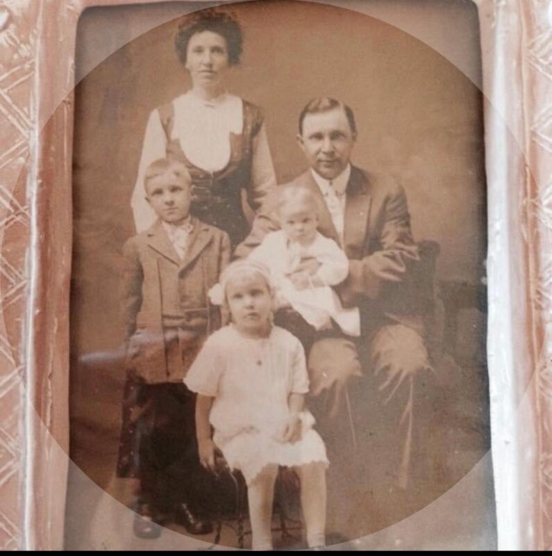 Black and white photo of a family of five.