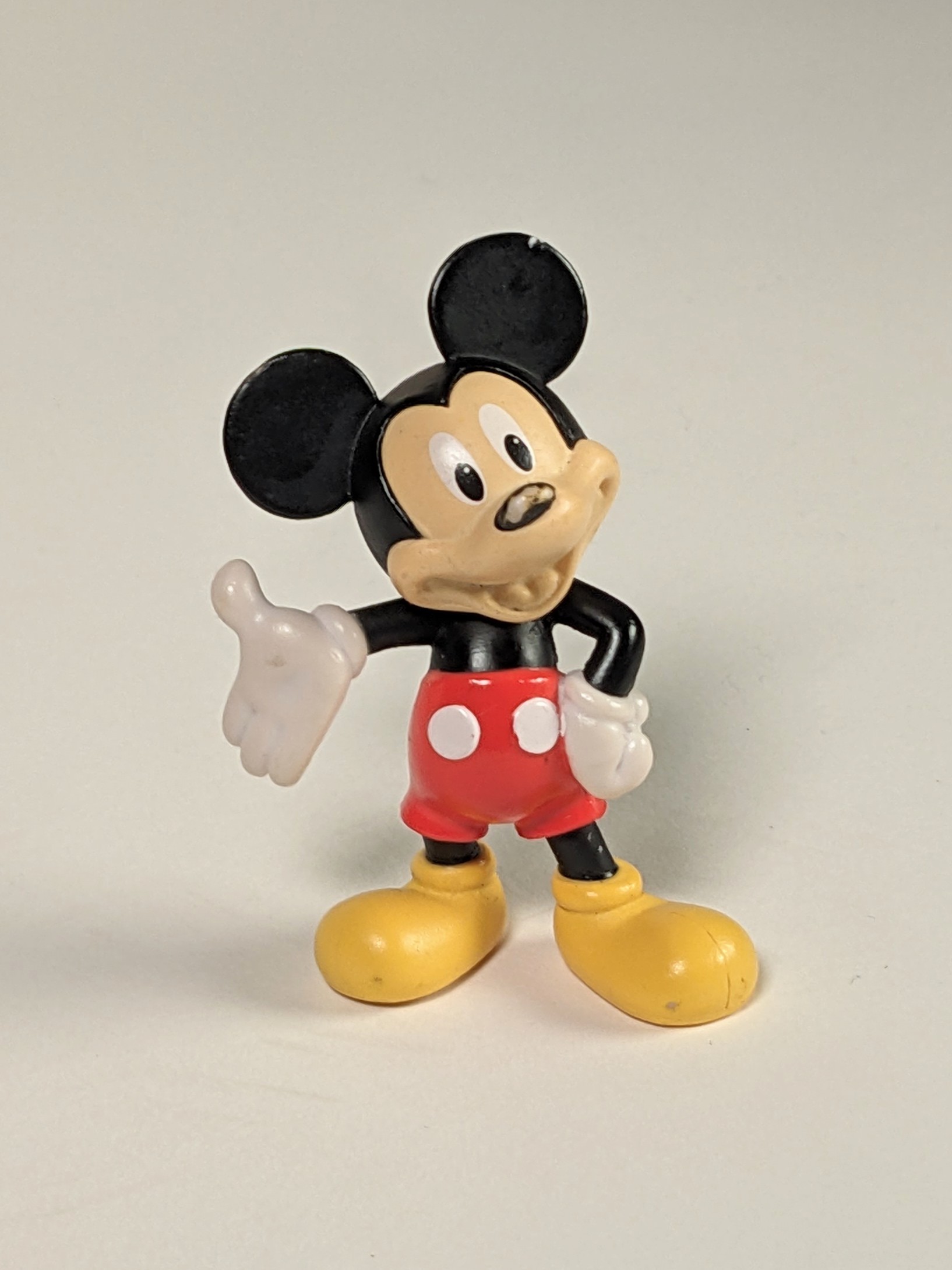 Photo of a small Mickey Mouse statuette.