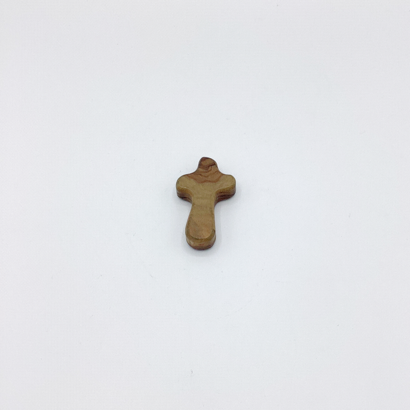 Photo of a small wooden cross.